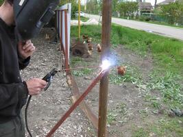 Welding of steel square pipe electric welding photo