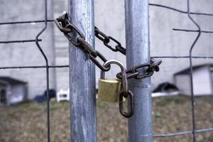 Padlock closed with chain photo