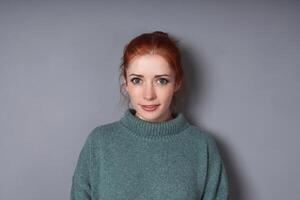 mid adult woman wearing turtleneck sweater photo