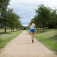 young woman jogging photo