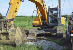 Bucket of the excavator on installation photo