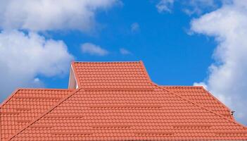 The roof of corrugated sheet red orange photo