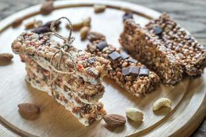 Granola bars with dried berries and chocolate photo