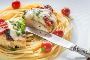 Baked chicken with parmesan and mozzarella photo