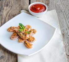 Shrimps with sauce photo