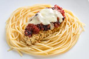 Baked chicken with parmesan and mozzarella photo