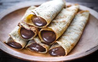 Crepes with chocolate cream photo