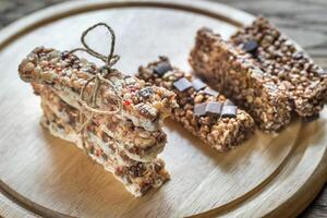 Granola bars with dried berries and chocolate photo