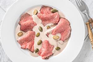 Portion of Vitello tonnato photo