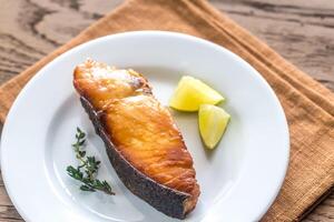 Fried salmon with lime photo