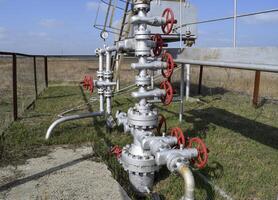 Equipment of an oil well. Shutoff valves and service equipment photo