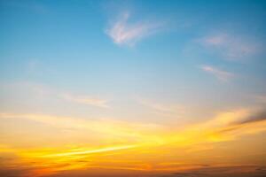 Beautiful , luxury soft gradient orange gold clouds and sunlight on the blue sky perfect for the background, take in everning,Twilight, Large size, high definition landscape photo