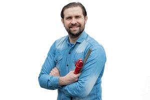 Young smiling soldier looking at the camera in a jean shirt. photo