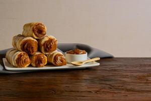 Dulce de leche cannons, typical Argentine dessert. photo