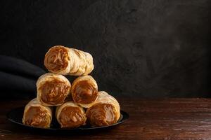 Dulce de leche cannons, typical Argentine dessert. photo