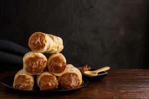 Dulce de leche cannons, typical Argentine dessert. photo