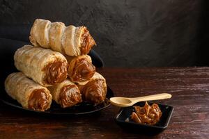 Dulce de leche cannons, typical Argentine dessert. photo