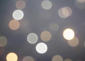 Luxury Blurred abstract background with gold and silver bokeh. photo