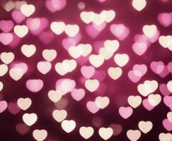 Pink blurred abstract background with cute bokeh hearts for mothers day. photo