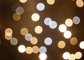 Luxury Blurred abstract background with gold and silver bokeh. photo