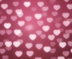 Pink Blurred Abstract Background with Cute Hearts Bokeh for Valentines Day photo