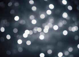 Silver abstract background with shiny silver floating bokeh. photo