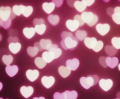 rosado borroso resumen antecedentes con linda bokeh corazones para cumpleaños. foto