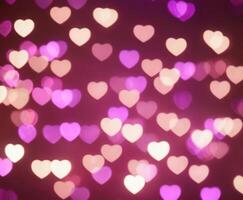 Blurred abstract background with bokeh hearts for valentines day. photo