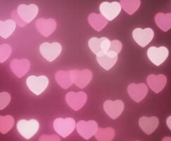 Pink blurred abstract background with cute bokeh hearts. photo