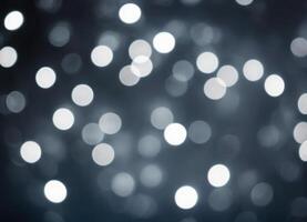 Silver abstract background with shiny silver floating bokeh. photo