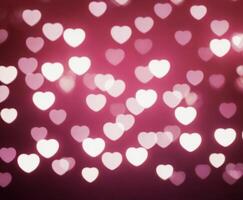 Pink blurred abstract background with cute bokeh hearts for mothers day. photo