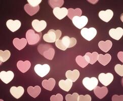 Pink blurred abstract background with cute bokeh hearts. photo