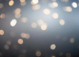 Luxury Blurred abstract background with gold and silver bokeh. photo