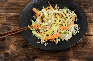 Chinese salad with enoki mushrooms. photo