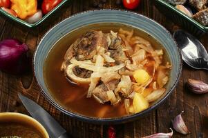 Traditional soup borscht in bowl. photo