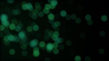 Abstract bokeh colored particles. Motion colors background, shining lights, sparks and particles video