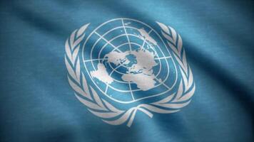 United Nations flag. The United Nations flag waving in the wind. International flag of UN video