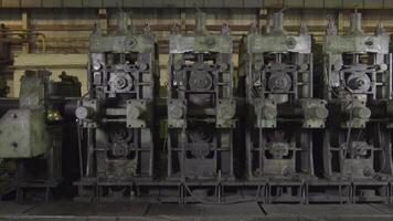 Machines for metal rolling at factory. Pipe mill at the plant video