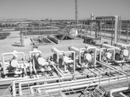 Heat exchangers in a refinery. The equipment for oil refining photo