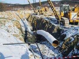 Construction of an oil and gas pipeline. Industrial equipment photo