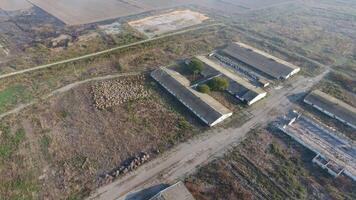 The building of an old farm for cattle. Top view of the farm. Storage of bales of hay on the old farm photo