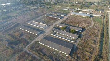 The building of an old farm for cattle. Top view of the farm. Storage of bales of hay on the old farm photo