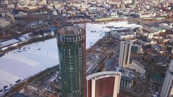 Aerial view on top modern skyscrapers continuing growth construction and development. Clip video