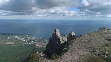 Peaceful meadow and view of the city from the mountain against the sea. Shot. Aerial of the marine landscape video