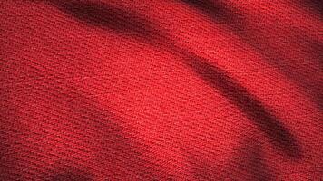 Denim fabric textured red fluttering. Animated movement of the canvas. The waves of the material video