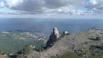 Peaceful meadow and view of the city from the mountain against the sea. Shot. Aerial of the marine landscape video