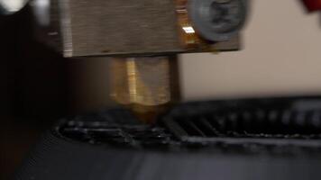 Close up of a modern 3D printer. Head of 3d printer in action. Close Up Of 3D Printer Operating In Design Studio video