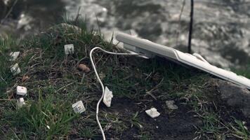 Broken Computer Keyboard. Broken computer keyboard in nature. The concept of technology's adverse impact on the world video