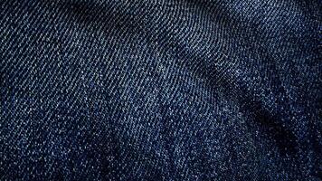 jeans tecido texturizado azul vibrando. animado movimento do a tela. a ondas do a material video