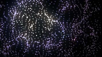 Beautiful and colorful blurred strays combined with small dot particles moving around through space. Colored dots moving in space. Excellent animation for your creative projects video